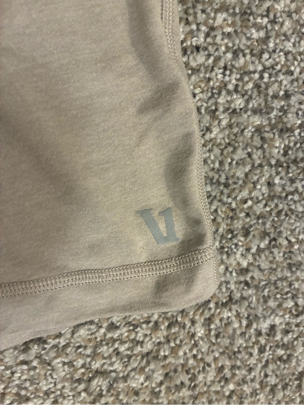 Vuori Men's Athletic Shorts in Beige with Reflective Logo